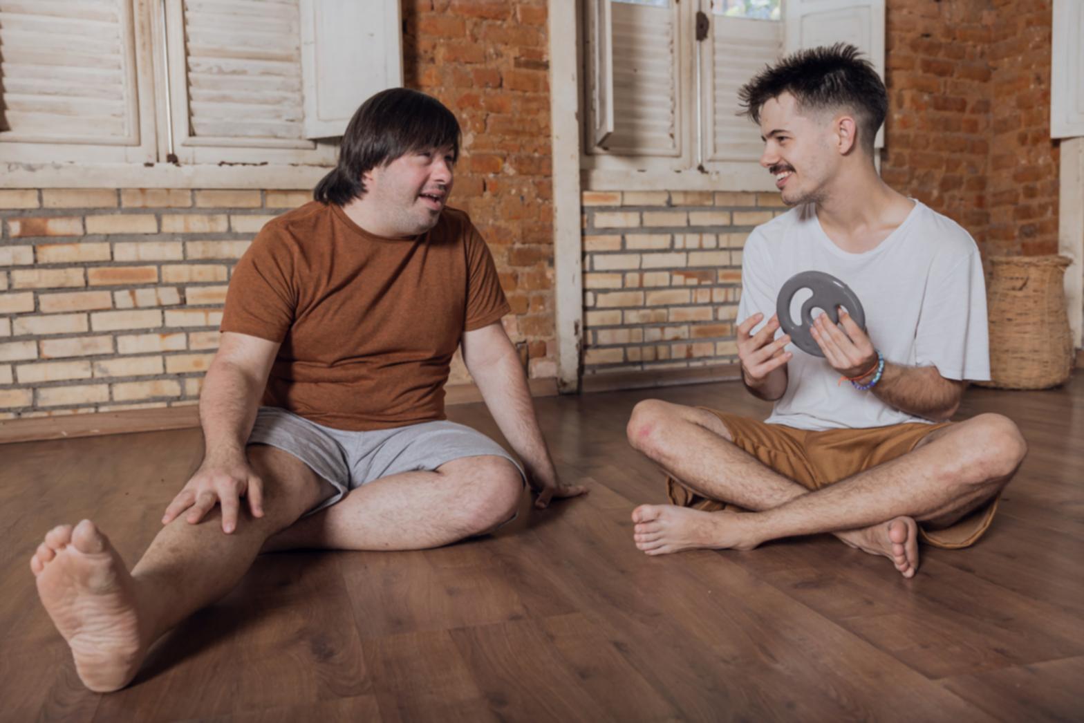 Group yoga practice showing diverse students in supportive environment