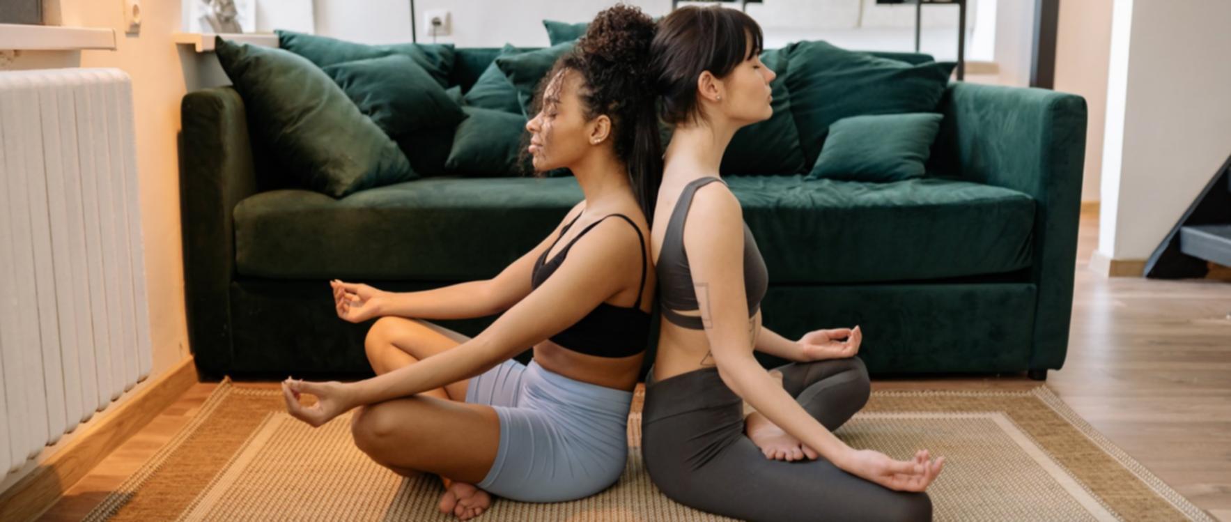 International yoga student practicing in Dubai studio