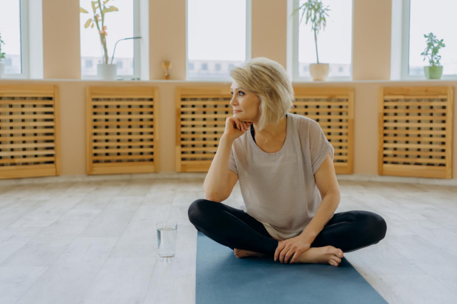 Early yoga class session showing intimate group setting